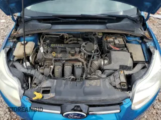 2012 Ford Focus SE z VIN 1FAHP3F29CL312819, wystawiony jako Copart lot #58964725 z przebiegiem 145 379 mil mil oraz Szkoda całkowita • Salvage title. Historia ofert i sprzedaży dostępna na DreamBid. Obrazek 11.