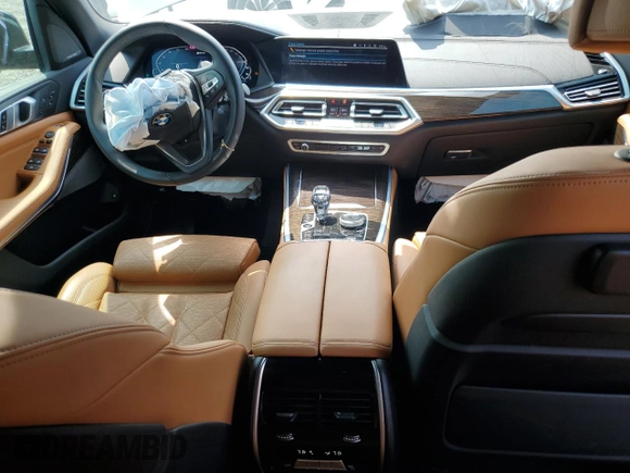 2023 BMW X5 xDrive45e z VIN 5UXTA6C09P9R00571, wystawiony jako Copart lot #61052995 z przebiegiem 9 702 mil mil oraz Szkoda całkowita • Salvage title. Historia ofert i sprzedaży dostępna na DreamBid. Obrazek 8.