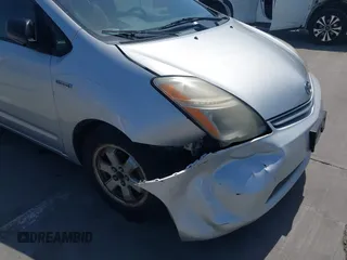 2007 Toyota Prius with VIN JTDKB20U777620685, listed as a IAAI auction lot 42095363 with 228,879 mi miles. Bid and sale history available at carsss.com. Image 6.
