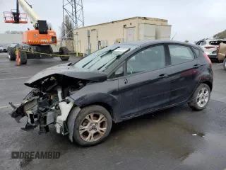 2015 Ford Fiesta SE with VIN 3FADP4EJXFM205097, listed as a Copart auction lot 86395584 with 79,588 mi miles and Salvage Title. Bid and sale history available at carsss.com. Image 1.
