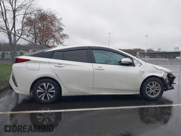 2017 Toyota Prius Plus with VIN JTDKARFP5H3004876, listed as a IAAI auction lot 41972573 with 148,670 mi miles and . Bid and sale history available at DreamBid. Image 13.