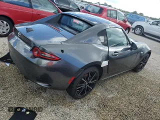 2024 Mazda MX-5 Miata Grand Touring z VIN JM1NDAM73R0603254, wystawiony jako Copart lot #74551704 z przebiegiem Nie podano mil oraz Nie do naprawy • Non repairable. Historia ofert i sprzedaży dostępna na DreamBid. Obrazek 3.