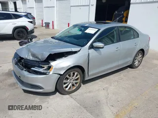 2012 Volkswagen Jetta Sedan SE w/Convenience with VIN 3VWDX7AJ1CM401939, listed as a IAAI auction lot 41941070 with 123,611 mi miles. Bid and sale history available at carsss.com. Image 17.