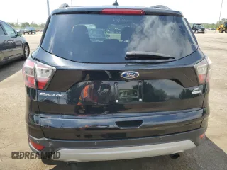 2017 Ford Escape SE z VIN 1FMCU0GD5HUA47616, wystawiony jako Copart lot #57180915 z przebiegiem 193 358 mil mil oraz Czysty tytuł • Clean title. Historia ofert i sprzedaży dostępna na DreamBid. Obrazek 6.