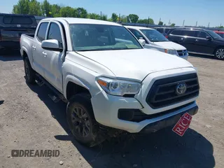 2021 Toyota Tacoma SR z VIN 3TMCZ5AN1MM406639, wystawiony jako IAAI lot #42027559 z przebiegiem Nie podano mil oraz . Historia ofert i sprzedaży dostępna na DreamBid. Obrazek 1.