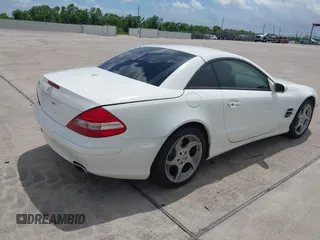 2007 Mercedes-Benz SL 550 with VIN WDBSK71F57F126438, listed as a IAAI auction lot 42743122 with 62,978 mi miles and . Bid and sale history available at DreamBid. Image 4.