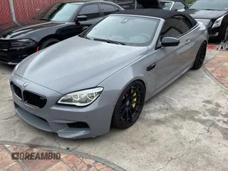 2016 BMW M6 z VIN WBS6G9C54GD932196, wystawiony jako Copart lot #53960063 z przebiegiem 46 162 mil mil oraz . Historia ofert i sprzedaży dostępna na DreamBid. Obrazek 2.
