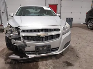 2013 Chevrolet Malibu LT with VIN 1G11C5SA6DF320045, listed as a IAAI auction lot 41745948 with 167,559 mi miles and . Bid and sale history available at DreamBid. Image 11.