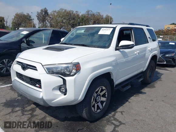 2021 Toyota 4Runner TRD Off Road Premium with VIN JTERU5JR7M5940287, listed as a IAAI auction lot 42592875 with 21,771 mi miles and . Bid and sale history available at DreamBid. Image 2.