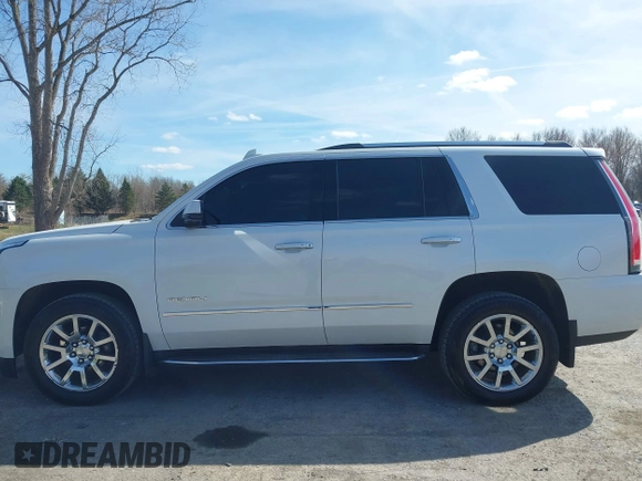 2017 GMC Yukon Denali with VIN 1GKS2CKJ4HR148397, listed as a IAAI auction lot 41942659 with 167,719 mi miles. Bid and sale history available at carsss.com. Image 14.