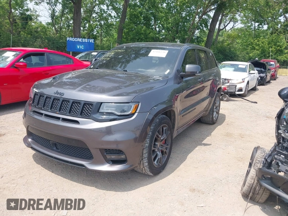 2018 Jeep Grand Cherokee SRT z VIN 1C4RJFDJ7JC281644, wystawiony jako IAAI lot #42481239 z przebiegiem 160 218 mil mil oraz . Historia ofert i sprzedaży dostępna na DreamBid. Obrazek 18.