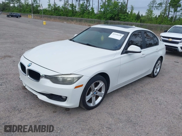 2015 BMW 3 Series 328i with VIN WBA3A5C50FF608327, listed as a IAAI auction lot 42136156 with 213,945 mi miles. Bid and sale history available at carsss.com. Image 17.