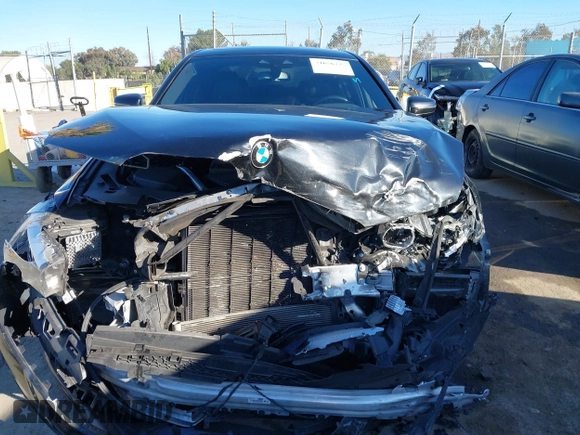 2019 BMW 5 Series 530e with VIN WBAJA9C57KB399541, listed as a IAAI auction lot 41656775 with 96,523 mi miles and . Bid and sale history available at DreamBid. Image 12.