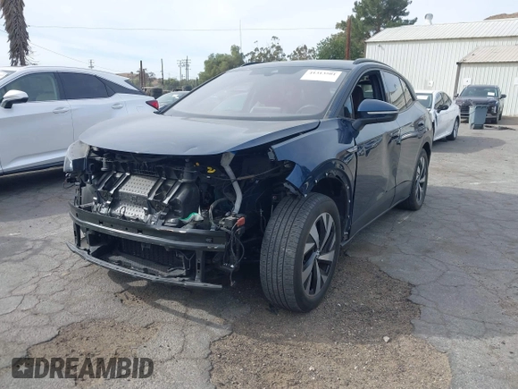 2023 Volkswagen ID.4 Pro z VIN 1V2DNPE8XPC019169, wystawiony jako IAAI lot #41313501 z przebiegiem 32 552 mil mil oraz . Historia ofert i sprzedaży dostępna na DreamBid. Obrazek 21.