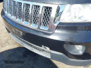 2011 Jeep Grand Cherokee Overland with VIN 1J4RS6GGXBC659349, listed as a IAAI auction lot 41778399 with 219,624 mi miles and . Bid and sale history available at DreamBid. Image 18.