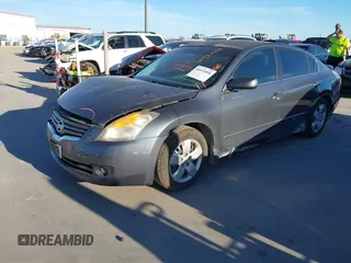 2007 Nissan Altima 2.5 with VIN 1N4AL21E87C213018, listed as a IAAI auction lot 40932058 with 195,817 mi miles. Bid and sale history available at carsss.com. Image 17.