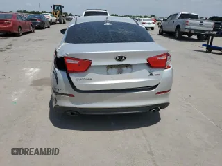 2014 Kia Optima LX with VIN 5XXGM4A71EG344934, listed as a Copart auction lot 60271204 with 308,991 mi miles and Salvage Title. Bid and sale history available at carsss.com. Image 6.
