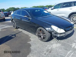 2007 Mercedes-Benz CLS-Class 5.5L with VIN WDDDJ72XX7A096053, listed as a IAAI auction lot 41358069 with 152,940 mi miles. Bid and sale history available at carsss.com. Image 1.