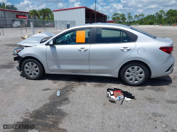 2022 Kia Rio S with VIN 3KPA24AD6NE435093, listed as a IAAI auction lot 39973971 with 71,435 mi miles. Bid and sale history available at carsss.com. Image 14.
