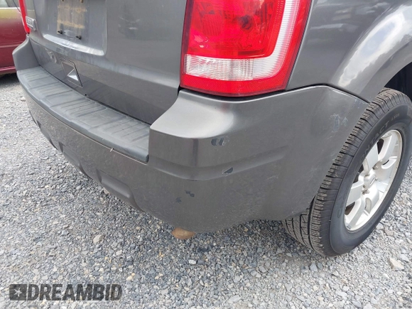 2011 Ford Escape Limited with VIN 1FMCU0E7XBKC69410, listed as a IAAI auction lot 42458547 with 126,022 mi miles and . Bid and sale history available at DreamBid. Image 6.