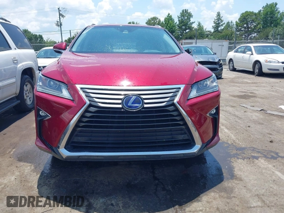 2016 Lexus RX 450h with VIN 2T2BGMCA1GC007583, listed as a IAAI auction lot 42590022 with 152,810 mi miles and . Bid and sale history available at DreamBid. Image 12.
