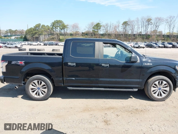 2018 Ford F-150 XL with VIN 1FTEW1EP2JFE13018, listed as a IAAI auction lot 42040276 with 97,563 mi miles. Bid and sale history available at carsss.com. Image 13.