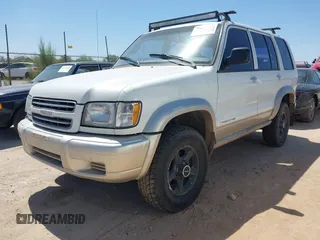 2000 Isuzu Trooper S z VIN JACDJ58X3Y7J01533, wystawiony jako IAAI lot #42227720 z przebiegiem 210 303 mil mil oraz . Historia ofert i sprzedaży dostępna na DreamBid. Obrazek 2.