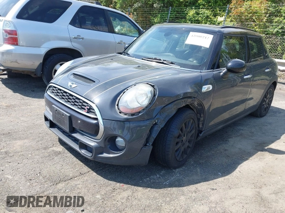 2017 MINI Hardtop 4 Door Cooper S z VIN WMWXU3C52H2D32498, wystawiony jako IAAI lot #42000212 z przebiegiem 70 231 mil mil oraz . Historia ofert i sprzedaży dostępna na DreamBid. Obrazek 6.