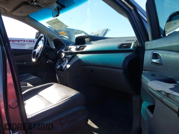 2011 Honda Odyssey EX-L with VIN 5FNRL5H6XBB083980, listed as a IAAI auction lot 42100308 with 191,361 mi miles and . Bid and sale history available at carsss.com. Image 5.