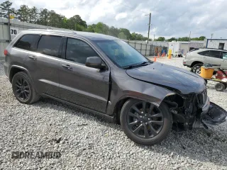 2018 Jeep Grand Cherokee Laredo E с VIN 1C4RJEAG3JC110487, выставлен на аукционе Copart как лот 54700795 с пробегом 135 665 миль миль и Списание • Salvage title. История ставок и продаж доступна на DreamBid. Изображение 4.