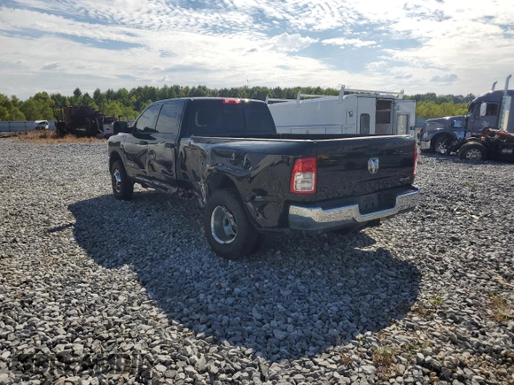 2021 Ram 3500 Tradesman with VIN 3C63RRGL2MG687238, listed as a Copart auction lot 69566674 with 87,944 mi miles and Salvage Title. Bid and sale history available at carsss.com. Image 2.