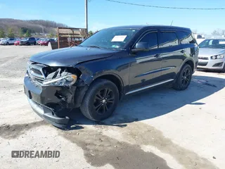2013 Dodge Durango SXT with VIN 1C4RDJAG2DC530407, listed as a IAAI auction lot 41837441 with 133,375 mi miles and . Bid and sale history available at DreamBid. Image 2.