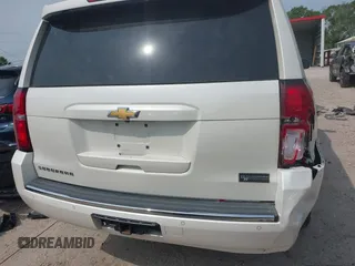 2015 Chevrolet Suburban LTZ with VIN 1GNSCKKC5FR740352, listed as a IAAI auction lot 39075234 with 112,945 mi miles and . Bid and sale history available at DreamBid. Image 17.