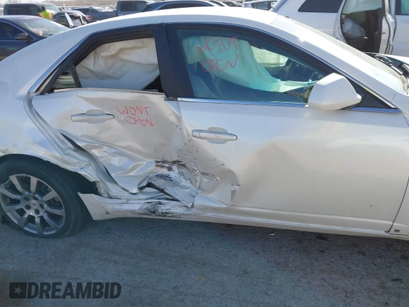 2008 Cadillac CTS RWD w/1SA with VIN 1G6DF577380211952, listed as a IAAI auction lot 41828784 with 273,085 mi miles. Bid and sale history available at carsss.com. Image 6.