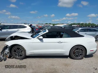 2018 Ford Mustang EcoBoost Premium z VIN 1FATP8UH3J5166286, wystawiony jako IAAI lot #42390424 z przebiegiem 92 077 mil mil oraz . Historia ofert i sprzedaży dostępna na DreamBid. Obrazek 14.