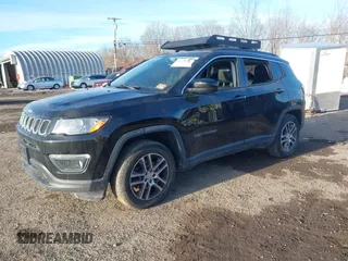 2018 Jeep Compass Altitude with VIN 3C4NJDBB5JT117506, listed as a IAAI auction lot 41447381 with 93,577 mi miles and . Bid and sale history available at carsss.com. Image 2.