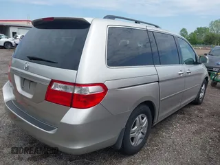 2007 Honda Odyssey EX-L with VIN 5FNRL38767B455948, listed as a IAAI auction lot 42154879 with 232,645 mi miles and . Bid and sale history available at DreamBid. Image 4.