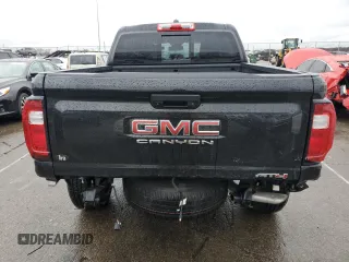 2023 GMC Canyon 4WD AT4 with VIN 1GTP6DEK6P1139567, listed as a Copart auction lot 85416794 with 26,583 mi miles and Salvage Title. Bid and sale history available at carsss.com. Image 6.