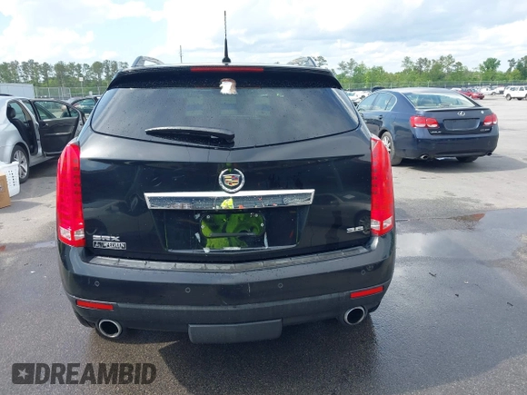 2014 Cadillac SRX Performance Collection with VIN 3GYFNCE31ES683465, listed as a IAAI auction lot 42107705 with 117,285 mi miles. Bid and sale history available at carsss.com. Image 16.