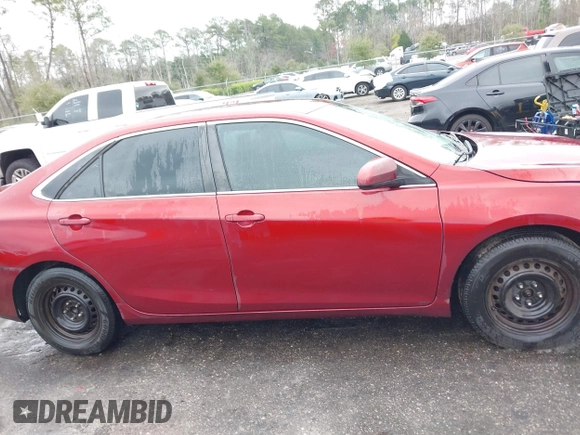 2015 Toyota Camry XLE with VIN 4T1BF1FK2FU982570, listed as a IAAI auction lot 41629755 with 245,224 mi miles. Bid and sale history available at carsss.com. Image 13.