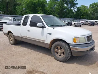 2002 Ford F-150 XL with VIN 1FTRX172X2NB30342, listed as a IAAI auction lot 42015209 with 1 mi miles. Bid and sale history available at carsss.com. Image 1.