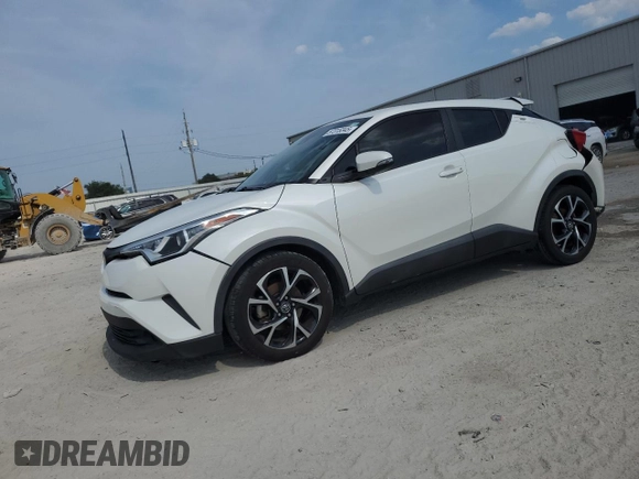 2019 Toyota C-HR XLE z VIN NMTKHMBX5KR079425, wystawiony jako Copart lot #57315345 z przebiegiem 109 441 mil mil oraz Szkoda całkowita • Salvage title. Historia ofert i sprzedaży dostępna na DreamBid. Obrazek 1.