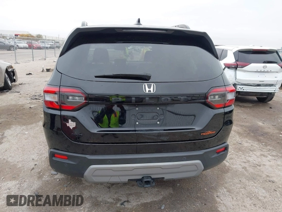 2023 Honda Pilot TrailSport with VIN 5FNYG1H63PB051646, listed as a IAAI auction lot 41069614 with 28,730 mi miles. Bid and sale history available at carsss.com. Image 16.