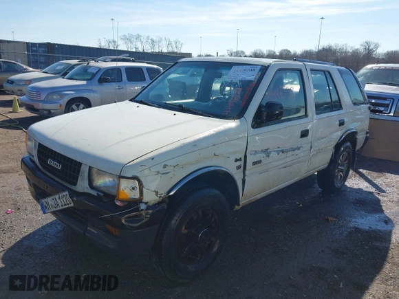 1997 Isuzu Rodeo z VIN 4S2CK58V2V4300048, wystawiony jako IAAI lot #41446738 z przebiegiem 195 609 mil mil oraz . Historia ofert i sprzedaży dostępna na DreamBid. Obrazek 2.