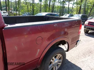 2006 Ford F-150 XLT with VIN 1FTPW14506FB81826, listed as a IAAI auction lot 42142287 with 136,768 mi miles. Bid and sale history available at carsss.com. Image 6.