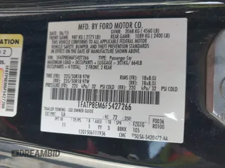 2015 Ford Mustang V6 with VIN 1FATP8EM6F5427266, listed as a IAAI auction lot 42003599 with 120,222 mi miles and . Bid and sale history available at DreamBid. Image 9.