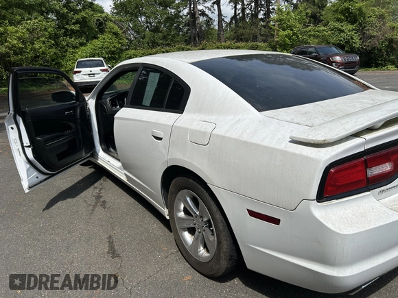 2014 Dodge Charger SE with VIN 2C3CDXBG8EH187998, listed as a IAAI auction lot 42175958 with 135,388 mi miles and . Bid and sale history available at carsss.com. Image 3.