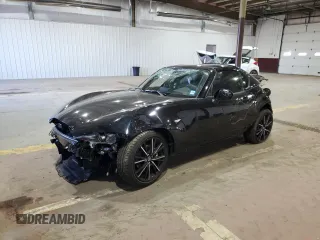 2024 Mazda MX-5 Miata Grand Touring z VIN JM1NDAM75R0606463, wystawiony jako Copart lot #81004924 z przebiegiem 868 mil mil oraz Nie do naprawy • Non repairable. Historia ofert i sprzedaży dostępna na DreamBid. Obrazek 1.