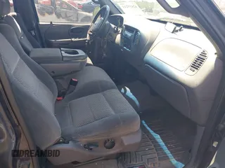 2001 Ford F-150 XLT с VIN 1FTRW07L41KA09067, выставлен на аукционе IAAI как лот 42459211 с пробегом 269 113 миль миль и . История ставок и продаж доступна на DreamBid. Изображение 5.