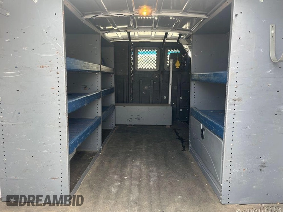 2013 Ford Econoline Cargo Commercial with VIN 1FTNE1EW6DDA61832, listed as a IAAI auction lot 42615381 with 111,015 mi miles and . Bid and sale history available at DreamBid. Image 10.